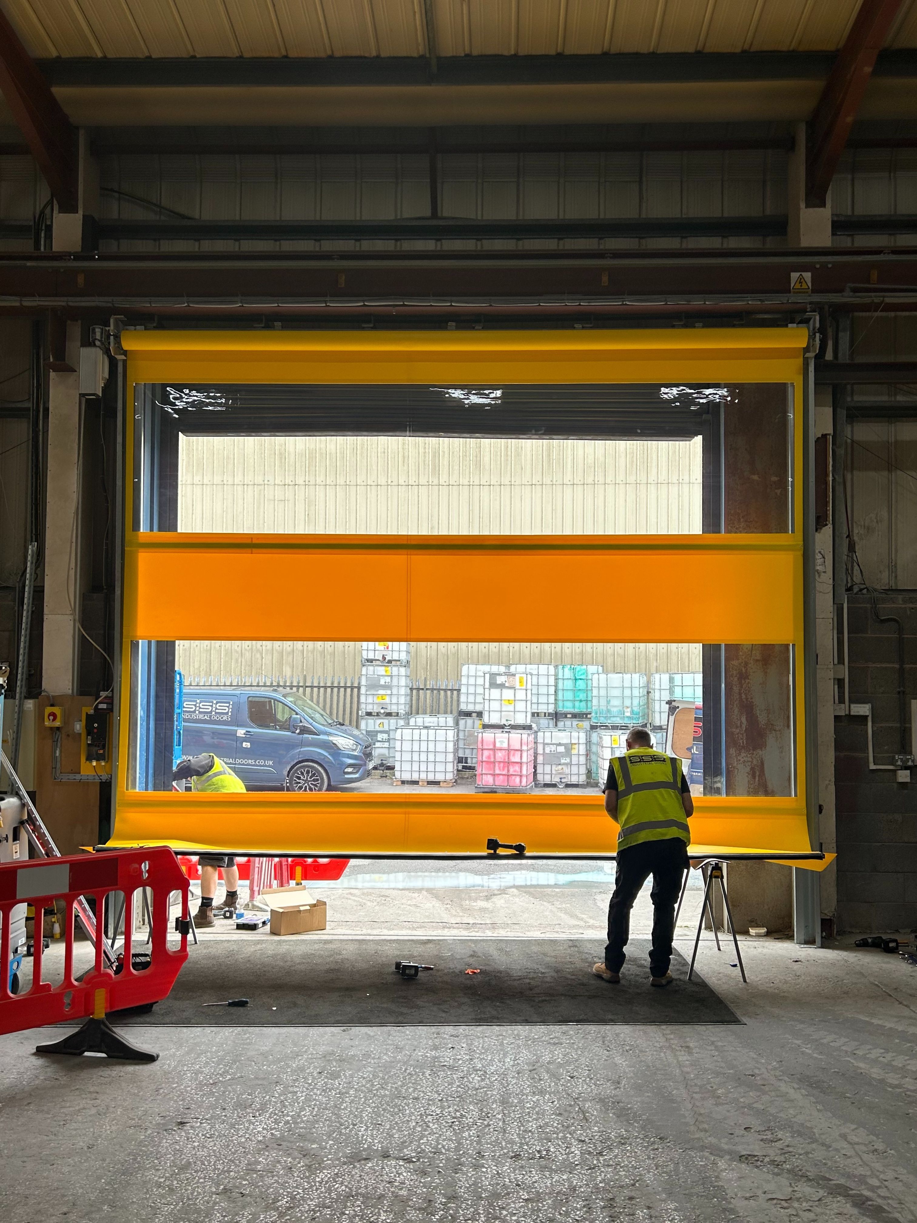 Servicing & Maintenance for Industrial Doors: Safety First, Every Season