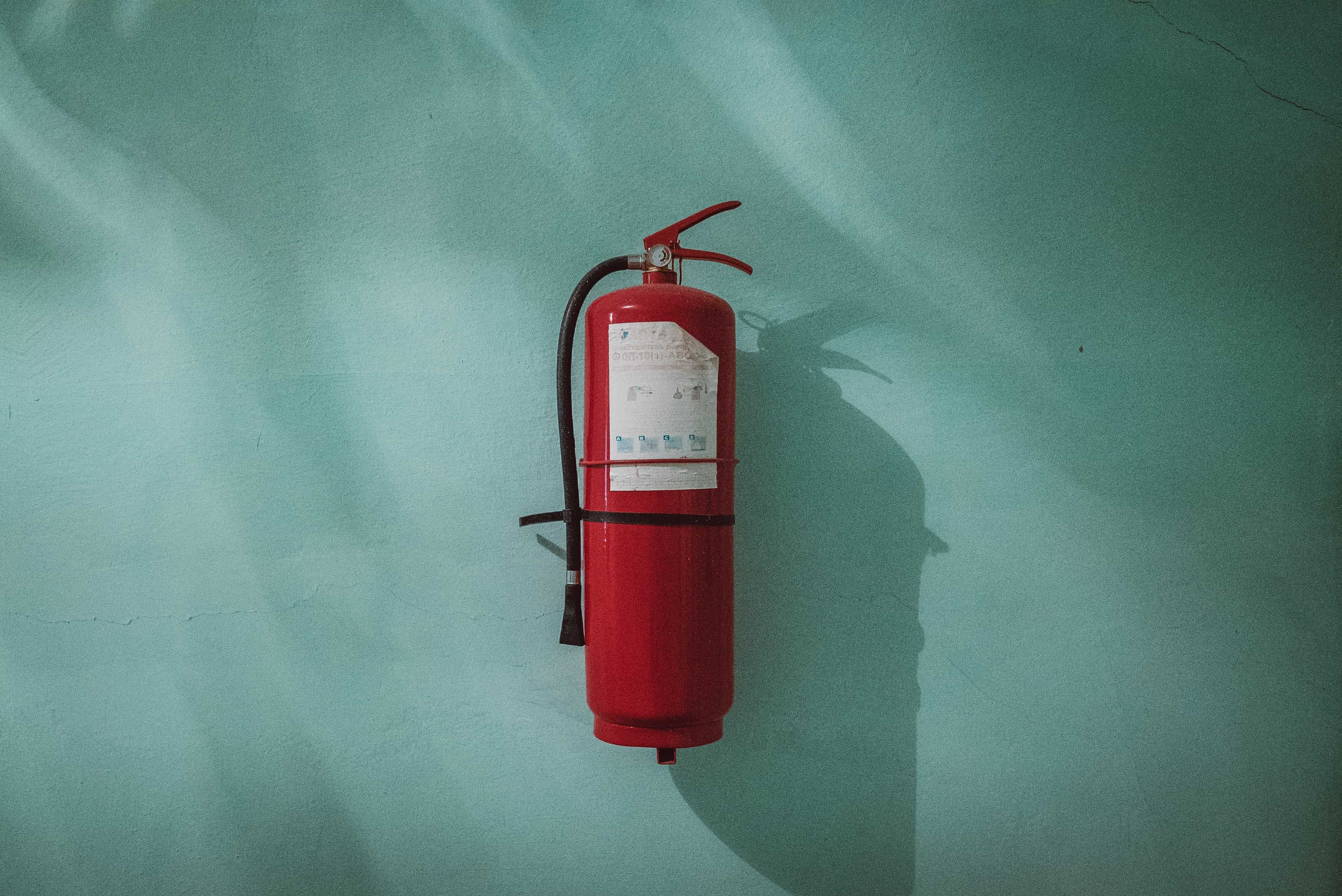 Fire extinguisher installed on wall